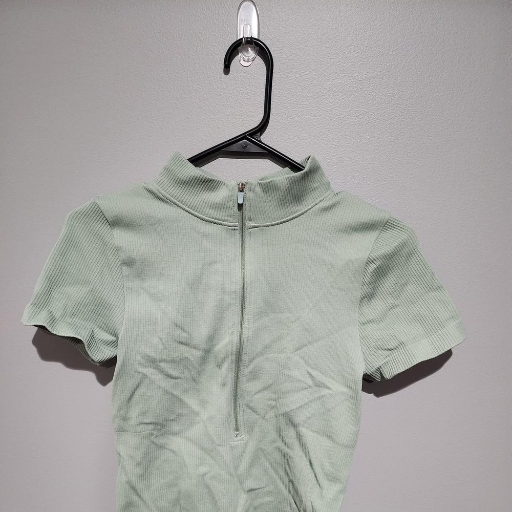OQQ light green ribbed quarter zip‎ Bodysuit top in a Large